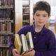 Illustration for article titled Third-Grader Clearly Biting Off More Than He Can Chew At Elementary School Book Fair